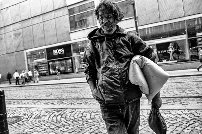 A man carrying a bag in the street
